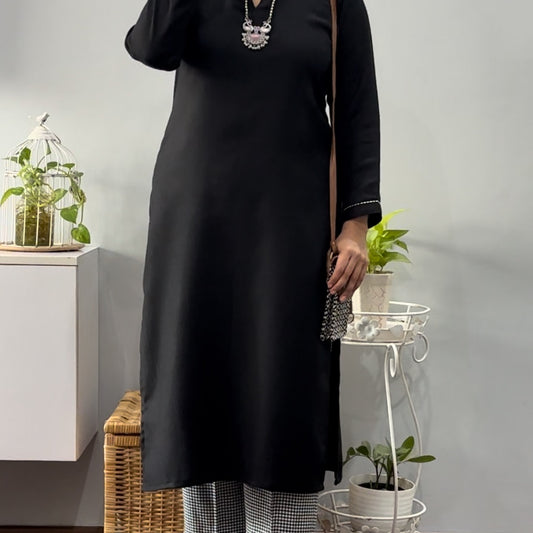 Anushri Winter black kurta and palazzo set